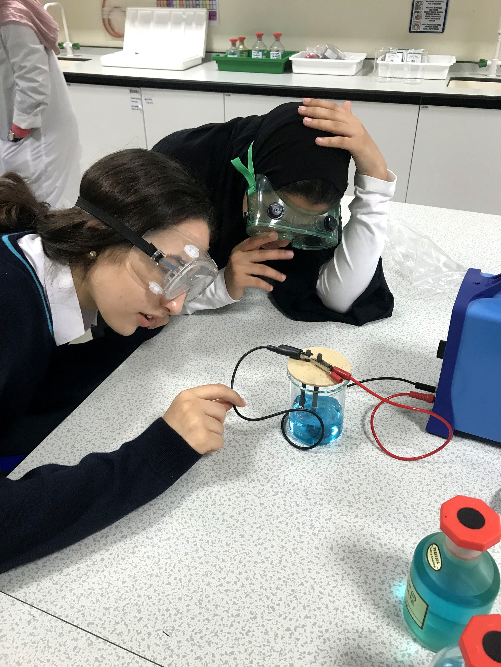 Student conducting an electrolysis practical
