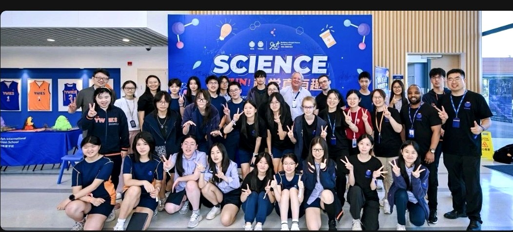 Working alongside teachers and students at a school science festival in China.