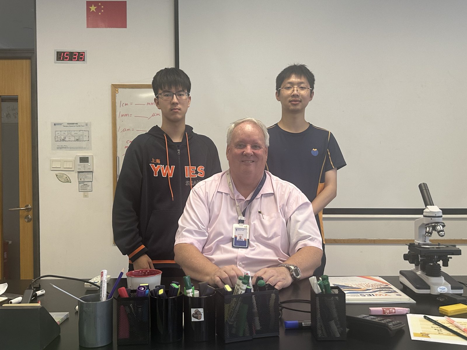 Andrew Greaves working alongside colleagues at a partner school in Shanghai