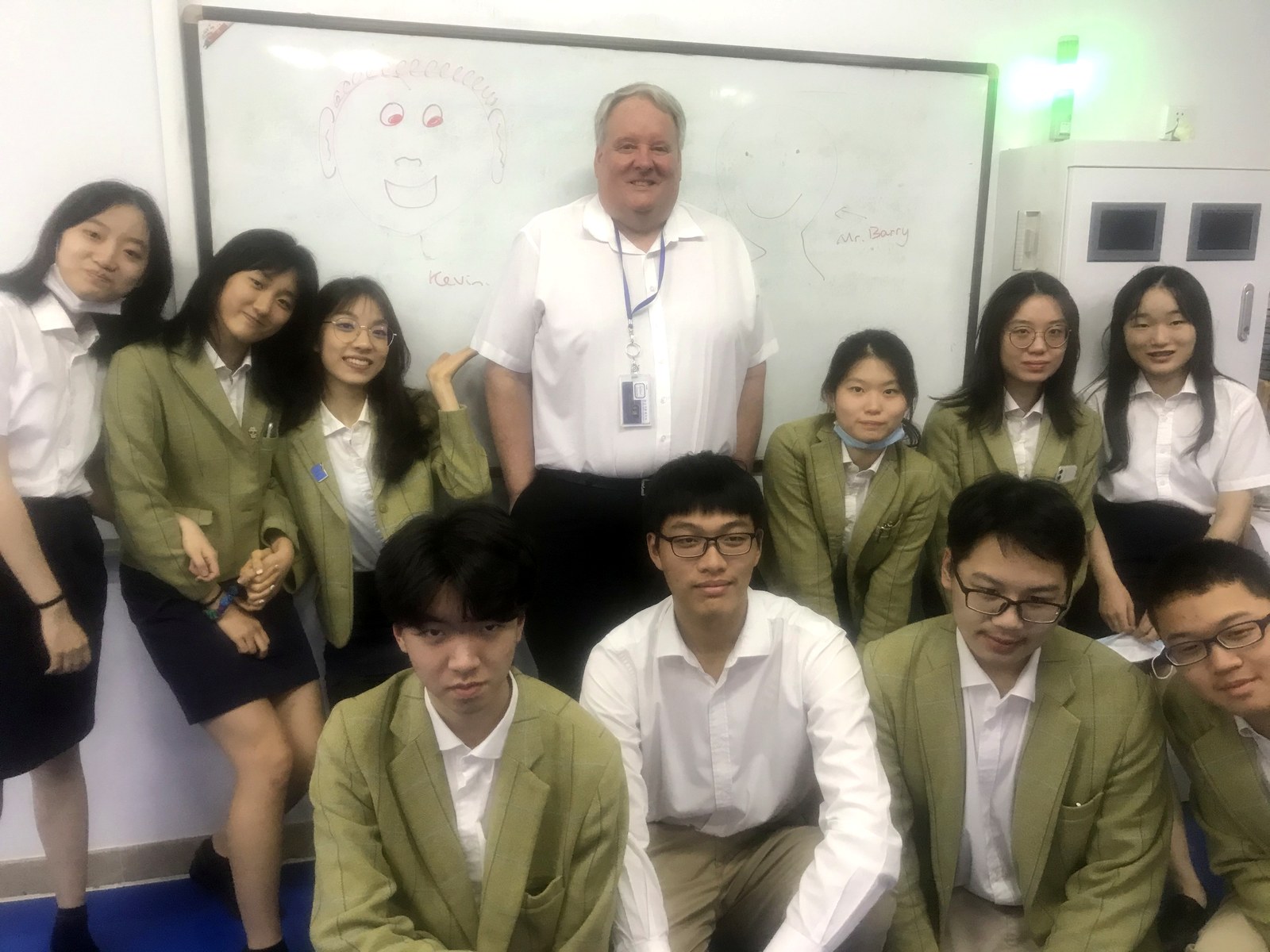 Teacher with a group of A Level Chemistry students